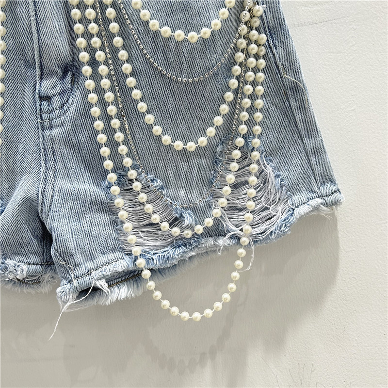 Buracos rasgados angustiados j - Distressed Jean Rip avaliação e preço