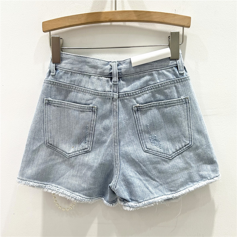 Buracos rasgados angustiados j - Distressed Jean Rip avaliação e preço