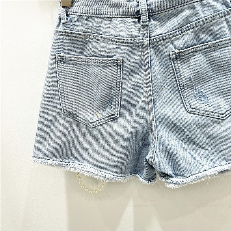 Buracos rasgados angustiados j - Distressed Jean Rip avaliação e preço